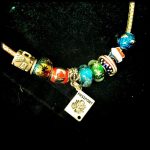 Travel souvenir necklace (and travel wishlist bracelet)